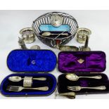 A mixed lot to include white metal sugar tongs, Epns wine funnel and wine slides, stirrup cup, boxed