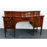 19th century mahogany serpentine ledgeback sideboard, with an arrangement of seven drawers, raised