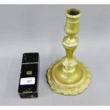 Early 18th century French silver form brass candlestick and an early 19th century Tole ware pipe box