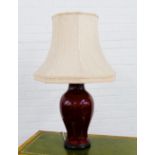 Chinese sang de boeuf style baluster table lamp and shade, 60cm