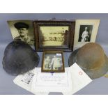 Two early 20th century Army tin helmets, a collection of black and white photographs etc., (a lot)