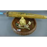 Mixed lot to include a hardwood bowl, faux ivory carvings, small brass paper knife and a parasol