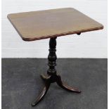 Mahogany tilt top table, the rectangular top with moulded edge raised on baluster turned column