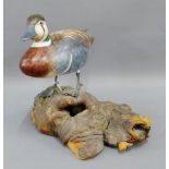 Baikal Teal painted wooden bird modelled on driftwood, 25cm high