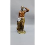 Painted plaster figure of a 'Golfer', 29cm high