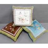 Three chinoiserie embroidered cushions, (3)