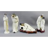 Group of four Chinese stoneware Craquelure glazed figures, two on shaped hardwood stands, tallest