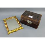 Small rectangular giltwood wall mirror together with an early 20th century leather cased grooming