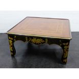 Large black lacquered and hardwood coffee table, the square top with a glass cover, the supports