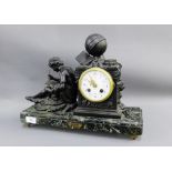 Etude, a Spelter figural mantle clock on a rectangular green hardstone base, 40cm long