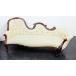 Mahogany framed three seater serpentine settee, the scrolling back with foliate carved toprail and