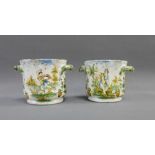 Pair of late 18th / early 19th century tin glazed olive pots with classical figures and other floral