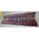 Persian runner, the worn blue field with allover floral pattern, 290 x 90cm