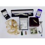 A mixed lot to include silver ingot pendant, various costume jewellery, faux pearls and a small