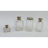 Four various early 20th century silver topped and glass scent bottles, (4) tallest 9cm high