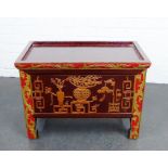 Chinoiserie box with lift up top and panelled front with stylised motifs in relief, 47 x 65cm