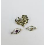Two Sterling silver brooches, each with CH makers mark together with a white metal Art Nouveau style