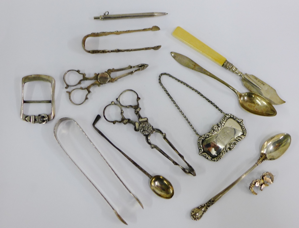 A mixed lot of silver items to include sifter spoon, sugar tongs, butter knife etc (a lot)