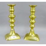 Pair of brass knop stemmed candlesticks with pushers, 25cm high, (2)