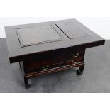 Oriental style low table, the rectangular top with a glazed panel top, opening to reveal a copper