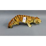 Continental pottery figure of a 'Tiger', 27cm long