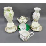 Mixed floral patterned pottery and porcelain to include a Royal Winton vase, Crown Ducal cups and