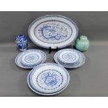 Quantity of blue and white Chinese rice patterned plates and serving dishes, ginger jar and cover