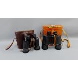 Two pairs of leather cased binoculars, (2)
