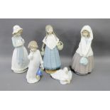 Collection of five NAO Spanish porcelain figures to include 'Three Girls', 'Child with Teddy', and a