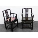 A pair of chinoiserie ebonised hardwood open armchairs, the shaped toprails over carved and