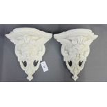 Two white painted plaster wall brackets / shelves, (2)