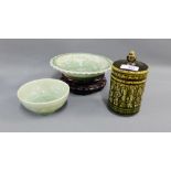 Group of three Thailand green glazed pottery to include two Celadon bowls and a darker green jar and