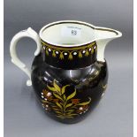 Large pearlware jug, circa. 1800, with brown slipped body decorated in Pratt colours (spout chips,