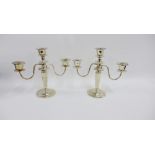 A pair of silver three light candelabra, on tapering stem and circular footrims, stamped Thailand