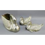 Pair of white metal duck figures, together with a large swan shaped planter, tallest 18cm, (3)
