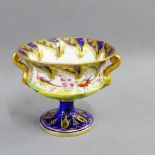 Early 19th century low vase on spreading foot with gilt dolphin handles, decorated in Mazarine