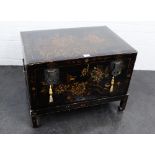 Black painted chinoiserie storage trunk on stand, 39 x 74cm