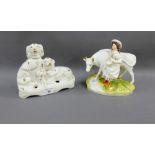 Unusual Staffordshire two dog inkwell group and a Staffordshire cow and milkmaid, (latter damaged)