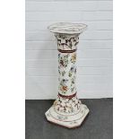 Floral patterned pottery jardiniere stand, 70cm
