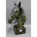 Resin bronze patinated horse head sculpture on square plinth base, 45cm high