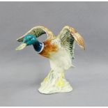 Beswick duck with impressed backstamp and number 750, 16cm high