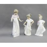 Collection of three Nao porcelain girl figures, tallest 26cm, (3)