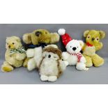 Collection of teddy bears to include a modern Steiff, a white bear with red scarf and hat, a