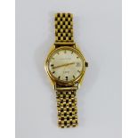 Gents vintage 9 carat gold cased Everite 17 Jewel wristwatch, with champagne dial and hour batons,