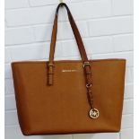 Michael Kors brown leather shoulder tote bag with detachable key ring and monogrammed lining
