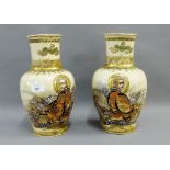 Pair of Japanese earthenware Moriage style vases with figure and dragon pattern, with character