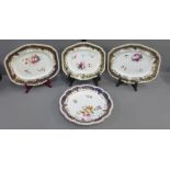 English porcelain dessert service with hand painted floral sprays to a white ground with blue and