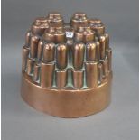 Copper jelly mould with impressed number 295, 12cm high