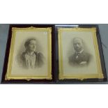 Pair of black and white portrait printed panels of a Man and Wife in faux giltwood and velvet backed