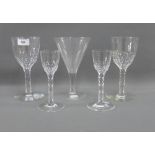 Collection of four facet stemmed late 19th century drinking glasses, together with an earlier wine